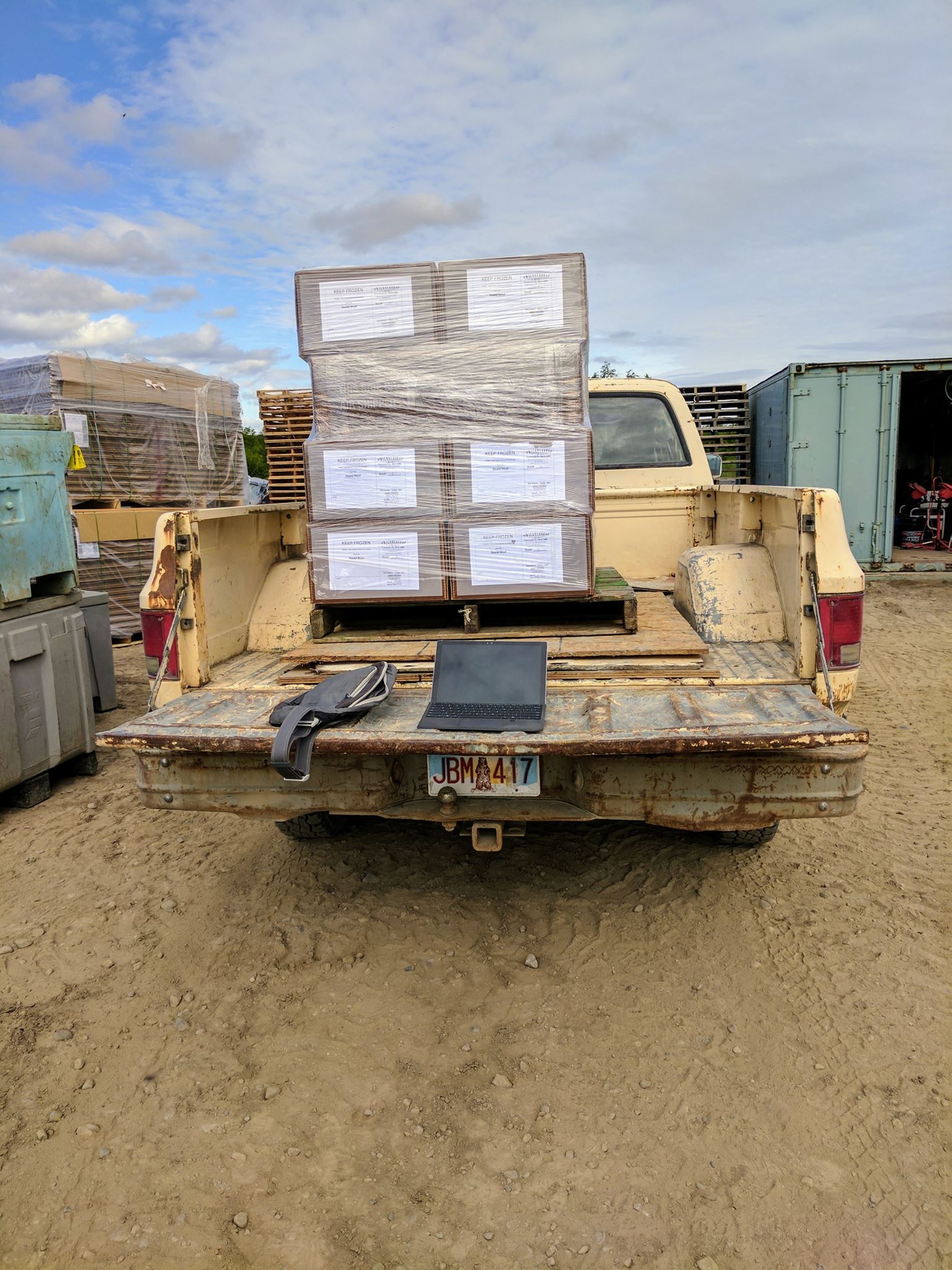 Pallets of packaged salmon in truck bed
